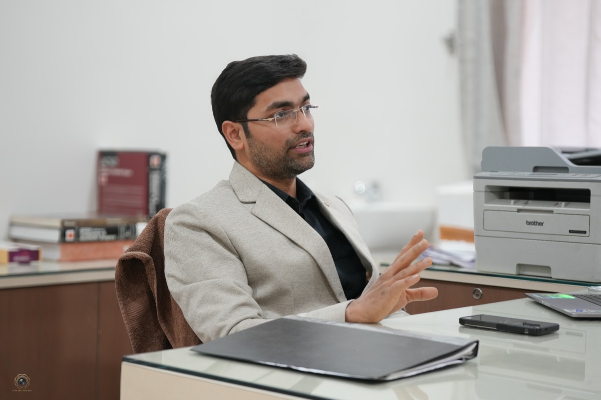 Dr. Adhyatm in consultation